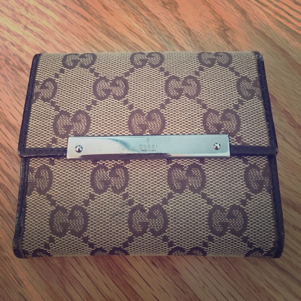 GUCCI WALLET monogram with Brown leather trim.